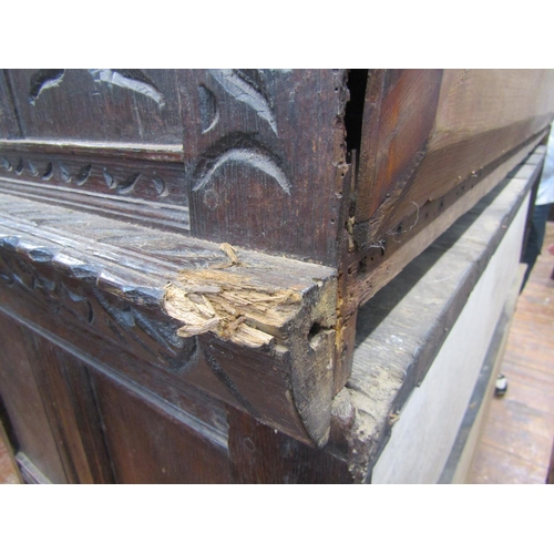 2725 - Substantial oak old English court cupboard with profuse carvings, with two panelled doors and large ... 