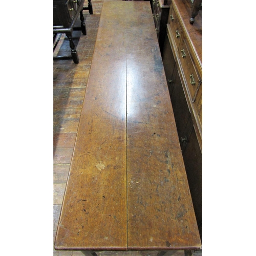 2728 - A Georgian dresser base with three drawers and shaped apron, 220cm long