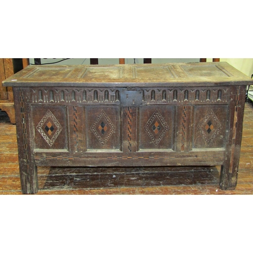 2741 - Early 18th century oak panelled coffer, with carved mouldings and inlaid geometric marquetry, 122cm ... 