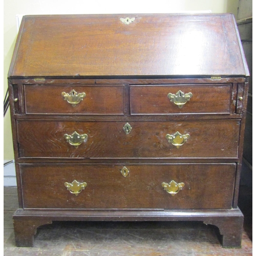 2742 - Georgian oak bureau of two long and two short drawers, with fitted interior, 97cm wide