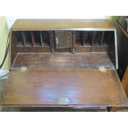 2742 - Georgian oak bureau of two long and two short drawers, with fitted interior, 97cm wide