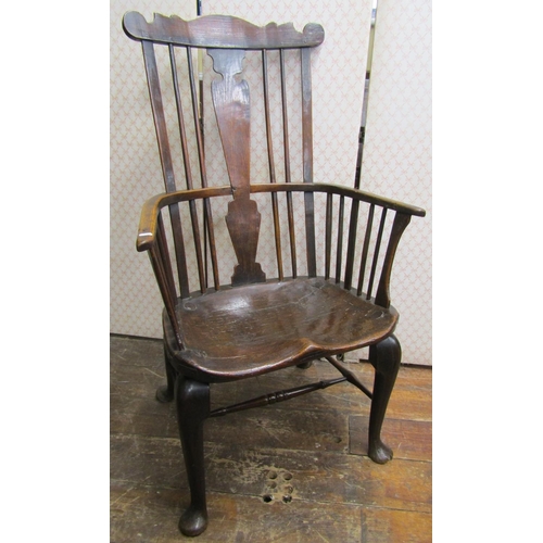 2749 - Very early Windsor elbow chair principally in elm and ash, with four pad feet and central rail beari... 