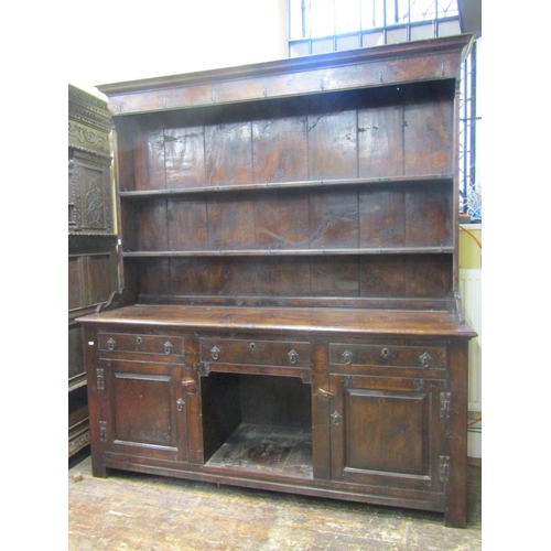 2763 - A Georgian style dog kennel dresser, with three frieze drawers and two cupboards, the boarded plate ... 