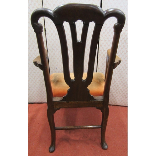 2769 - A Georgian  elbow chair with shaped cresting rail and pierced splat, shell and scroll carving and up... 