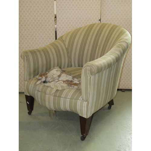 2350 - An Edwardian drawing room chair with upholstered finish, horseshoe shaped back, rolled arms (for re-... 