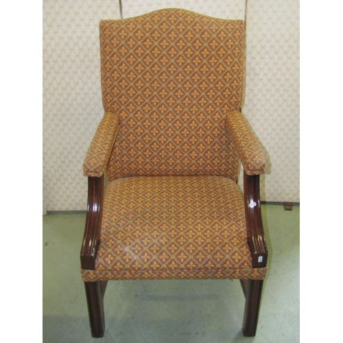 2373 - A reproduction Georgian style open arm chair with repeating floral sprig pattern upholstery, a simil... 