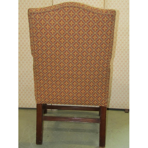 2373 - A reproduction Georgian style open arm chair with repeating floral sprig pattern upholstery, a simil... 