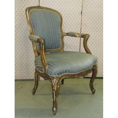 2374 - A 19th century futile/salon chair, upholstered seat, shield shaped panelled back and gilt show wood ... 