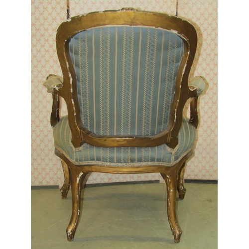 2374 - A 19th century futile/salon chair, upholstered seat, shield shaped panelled back and gilt show wood ... 