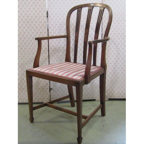 2382 - An inlaid Edwardian open elbow chair with pierced splats, upholstered pad seat and tapered supports,... 