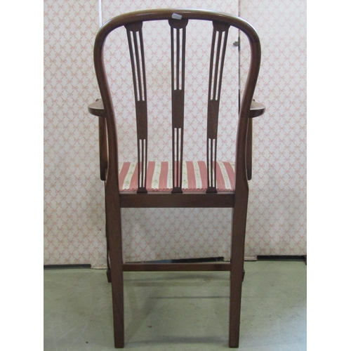 2382 - An inlaid Edwardian open elbow chair with pierced splats, upholstered pad seat and tapered supports,... 