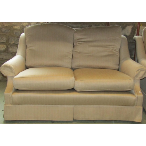 2383 - A pair of two seat sofas, 136cm wide and a matching armchair (3)