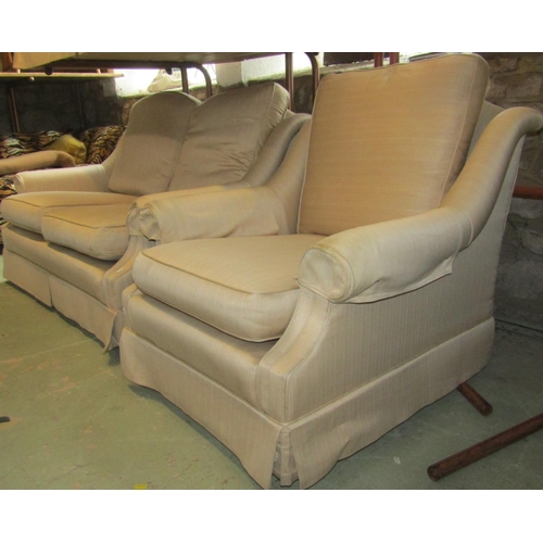 2383 - A pair of two seat sofas, 136cm wide and a matching armchair (3)