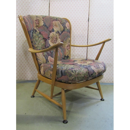 2396 - A vintage Ercol light beechwood Windsor style light stick back open elbow chair with loose cushions