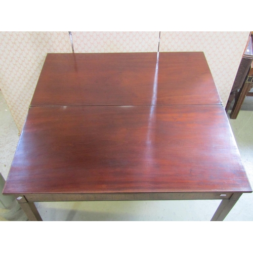 2400 - A Georgian mahogany rectangular foldover tea table with inlaid detail, 91cm wide