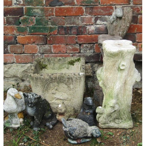 2047a - A weathered cast composition stone planter of square tapered form with rabbit, owl and hedgehog deta... 