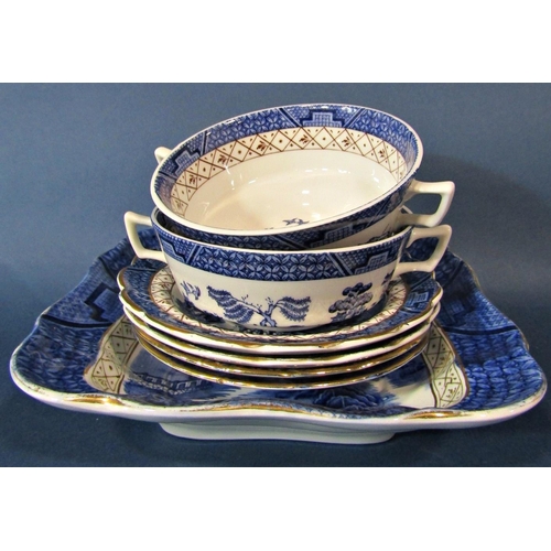 1030 - A collection of Booths Real Old Willow pattern ware including soup bowls and covers, tea pot, gradua... 