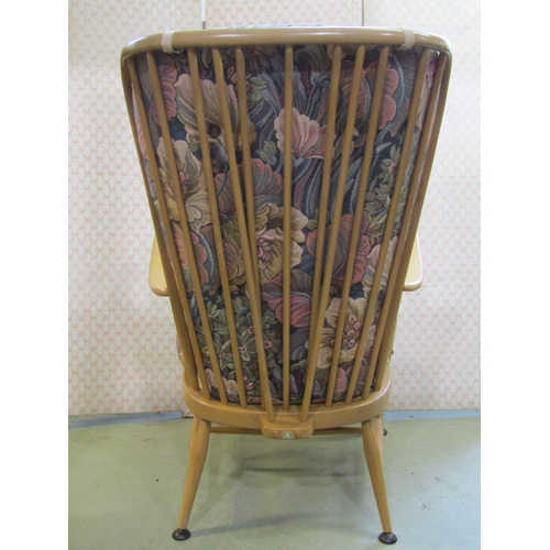 2390 - A pair of vintage Ercol light beechwood Windsor style high stick back open arm chairs with loose cus... 