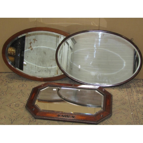 2475 - A collection of mainly Edwardian and later wall mirrors of varying size and design (9)