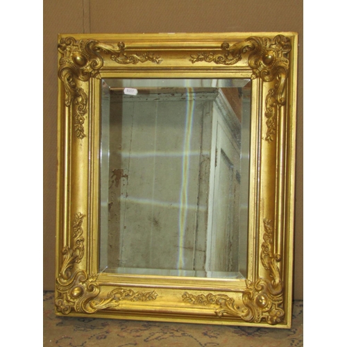 2481 - An antique style oval gilt framed wall mirror with repeating surround, 80 cm x 65 cm together with a... 