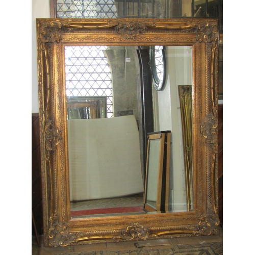 2486 - A large contemporary antique style rectangular wall mirror with bevelled edge plate, 159 cm x 129 cm