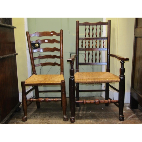 2643 - A collection of Georgian ladder and spindle back countrymade chairs, mainly in ashwood, with rush se... 