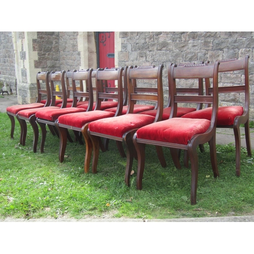 2646 - Set of twelve Regency mahogany bar-back dining chairs with moulded frames, drop in seats, the cresti... 