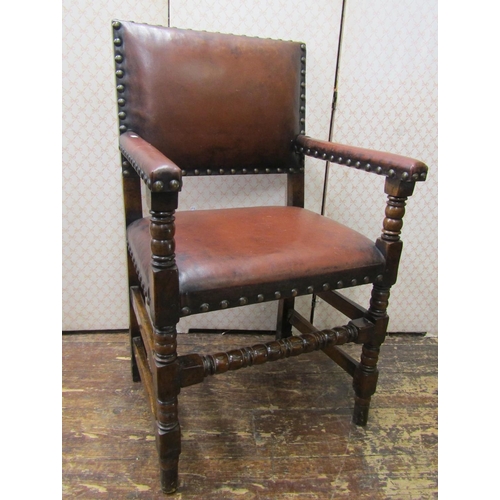 2732 - A set of seven Cromwellian style oak framed dining chairs, with Hyde upholstered seats and backs and... 