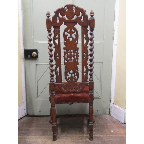 2772 - A Carolean style side chair in oak, with barley twist supports, carved and pierced splat and crestin... 