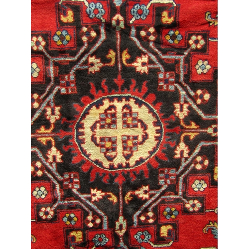 2511 - A North West Persian Tafresh Rug with central medallion and symmetrical flora and fauna design on a ... 