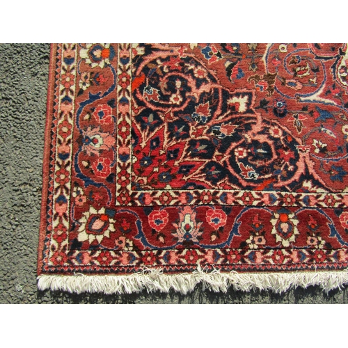 2514 - A Large Persian Bakhtiari Rug with shah abbas design in tones of crimson, indigo and natural wool wi... 