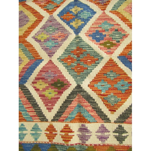 2516 - A Chobi kilim with repeated geometric diamond design in multicoloured tones, 152cm x 100cm approx