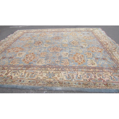 2520 - A Very Large Middle Eastern Rug with repeated pattern in blue, brown and green tones, 620 x 370 cm