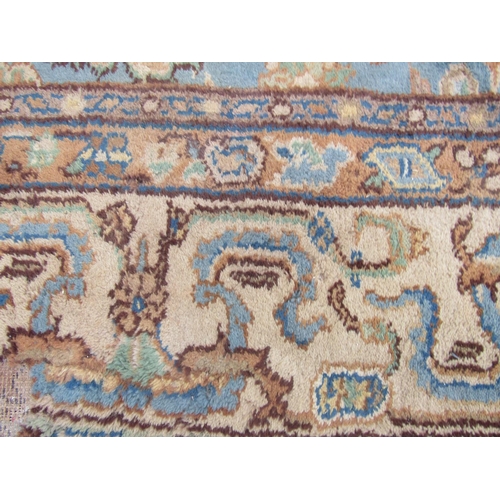 2520 - A Very Large Middle Eastern Rug with repeated pattern in blue, brown and green tones, 620 x 370 cm