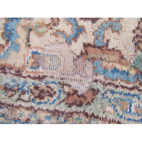 2520 - A Very Large Middle Eastern Rug with repeated pattern in blue, brown and green tones, 620 x 370 cm