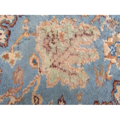 2520 - A Very Large Middle Eastern Rug with repeated pattern in blue, brown and green tones, 620 x 370 cm