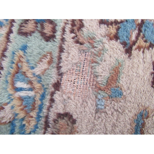 2520 - A Very Large Middle Eastern Rug with repeated pattern in blue, brown and green tones, 620 x 370 cm