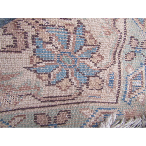 2520 - A Very Large Middle Eastern Rug with repeated pattern in blue, brown and green tones, 620 x 370 cm