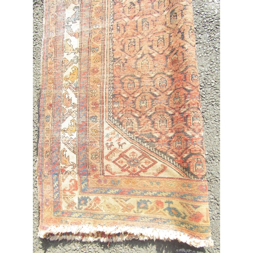 2521 - An old Persian Hamadan rug with central boteh design on an indigo field and animal motif corner brac... 