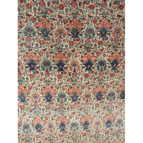 2535 - A Persian Qum carpet with a tightly knotted overall floral pattern, 195cm x 142cm approx