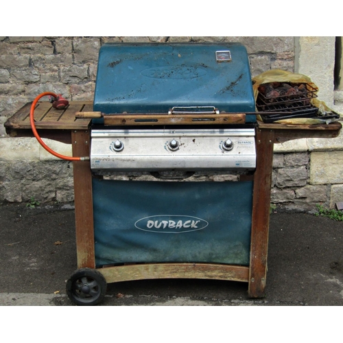 2037 - An Outback gas barbeque and portable combined wheeled stand