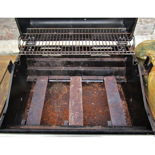 2037 - An Outback gas barbeque and portable combined wheeled stand