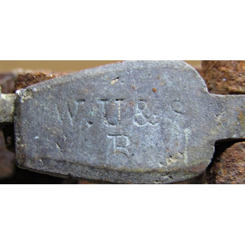 2189 - Three 19th century copper helmet shaped coal scuttles, together with two antique iron game traps (5)