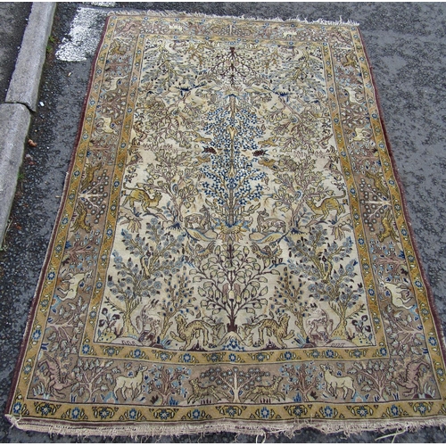 2539 - A Persian Tree of Life Design Rug in ochre, umber and blue tones, 140 x 210 cm