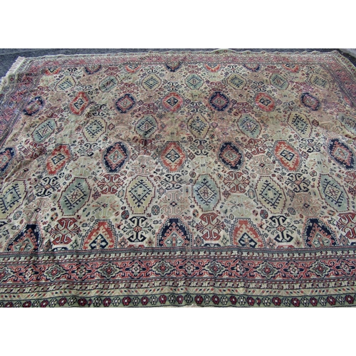 2540 - A Large Middle Eastern Rug with geometric design in neutral tones of brown, green and red, 320 x 240... 