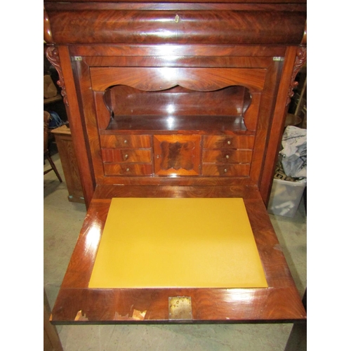 2321 - A 19th century mahogany secretaire abattant, the front elevation with well-matched flame veneers, en... 