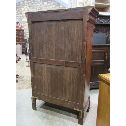 2321 - A 19th century mahogany secretaire abattant, the front elevation with well-matched flame veneers, en... 