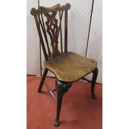 2771 - 18th century Windsor single chair in elm and fruitwood with dished seat, shaped and pierced splat an... 