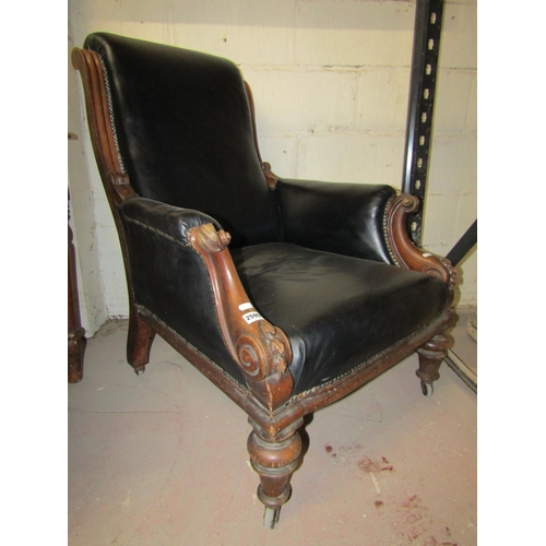 2595 - A Victorian mahogany drawing room chair with carved show wood frame and turned supports