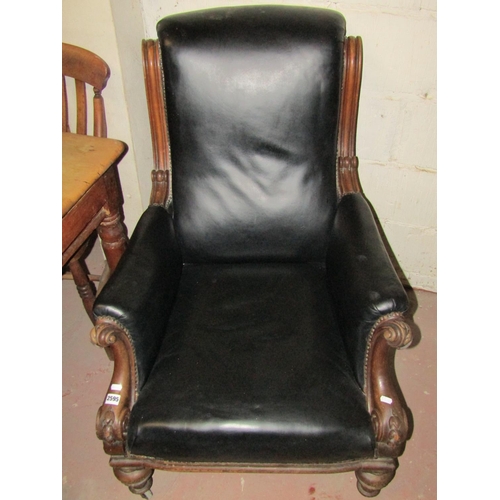 2595 - A Victorian mahogany drawing room chair with carved show wood frame and turned supports